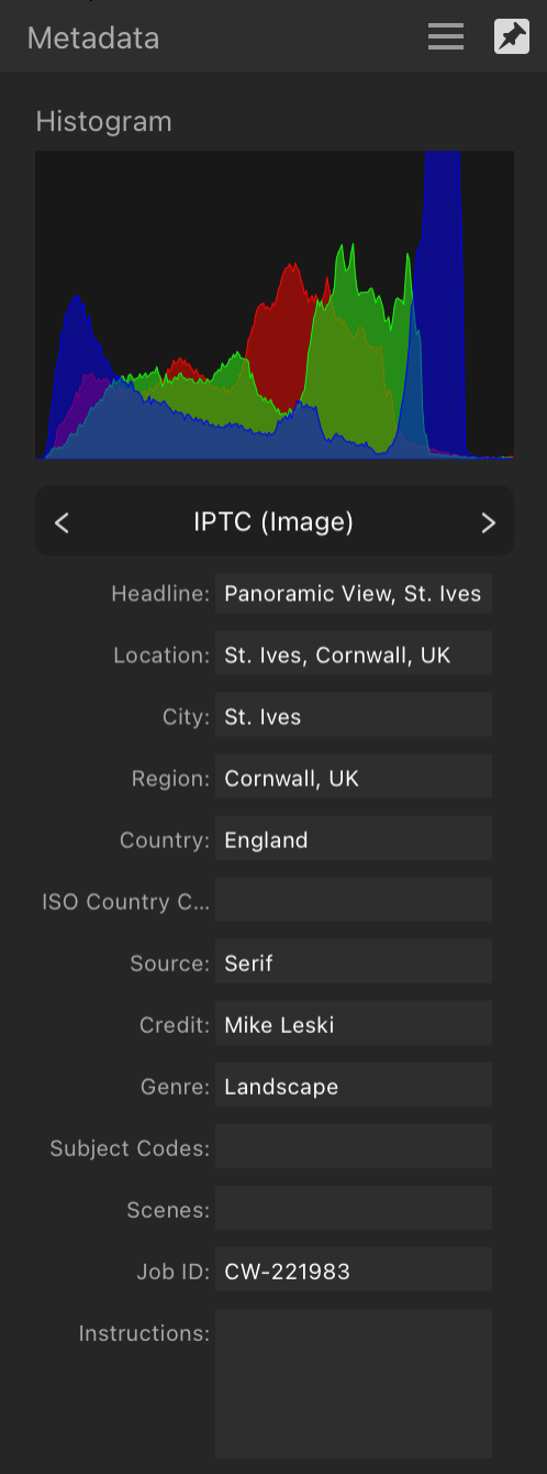 Metadata panel showing IPTC fields describing image contents, source and credit